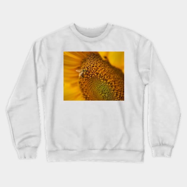 Bee on a sunflower working, macro shot Crewneck Sweatshirt by naturalis